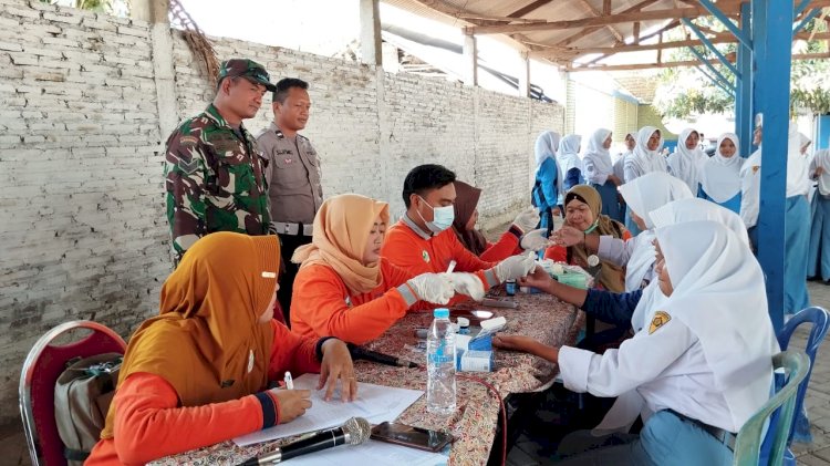 Sinergitas Polres Probolinggo Kota Bersama Kodim 0820 Salurkan Vitamin Tekan Stunting